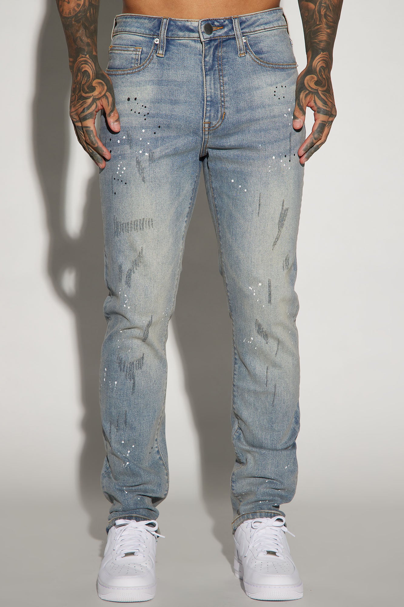 Ripped And Bleach Splatter Slim Jeans