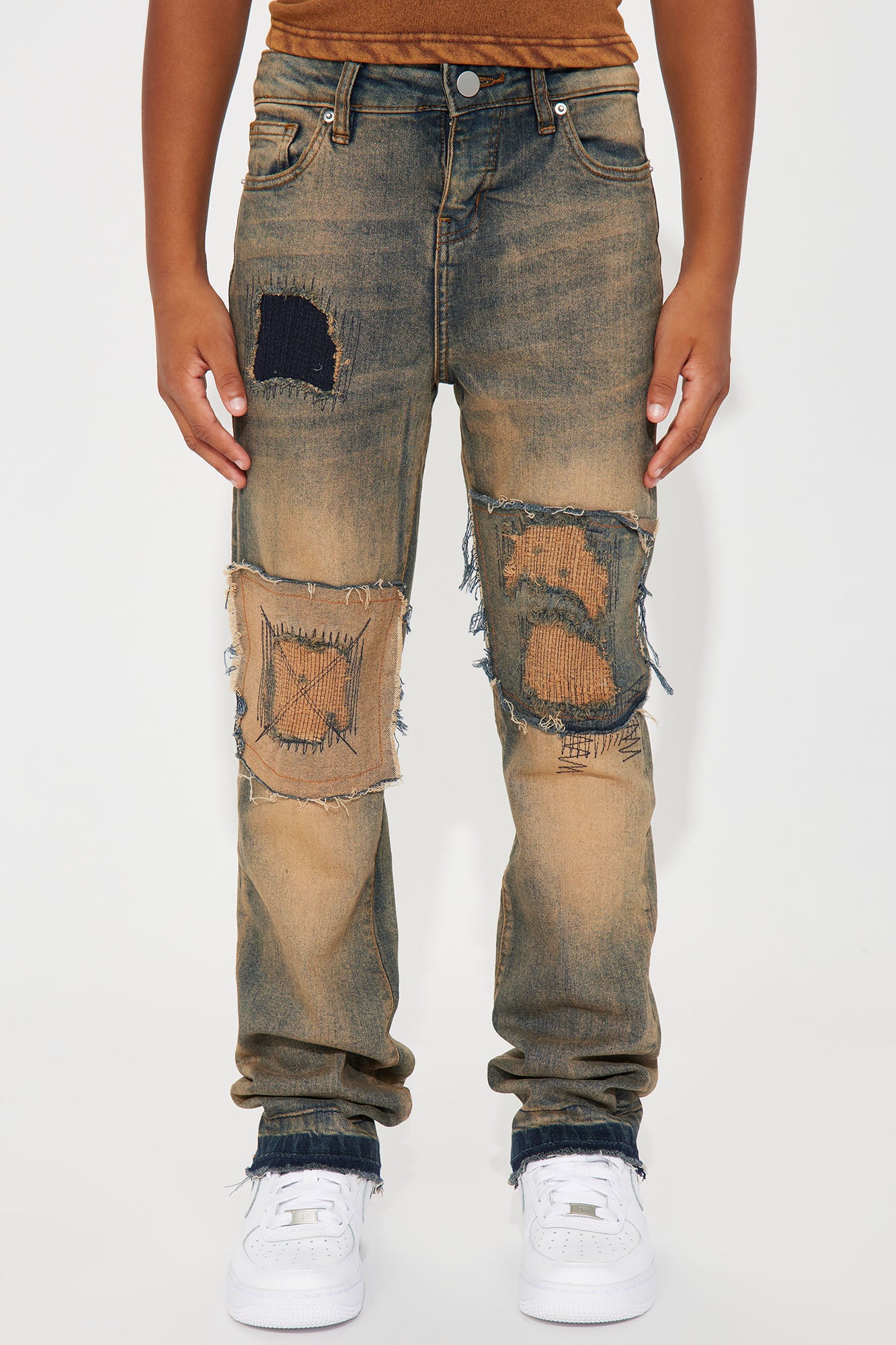 Mini Ripped And Repaired Slim Jeans