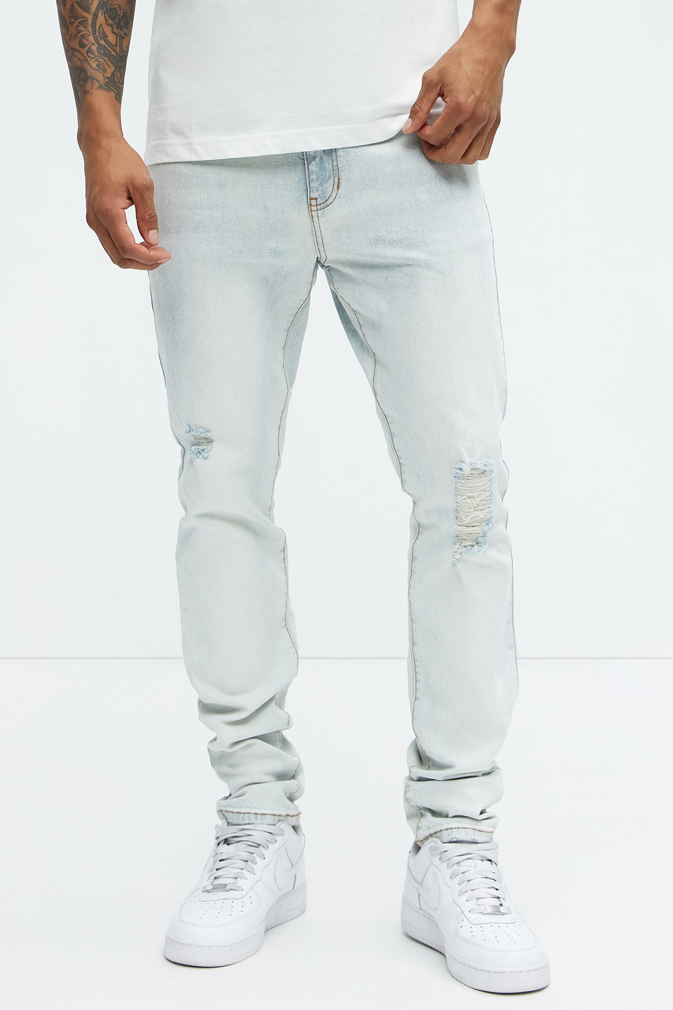 Take No L's Stacked Skinny Jeans